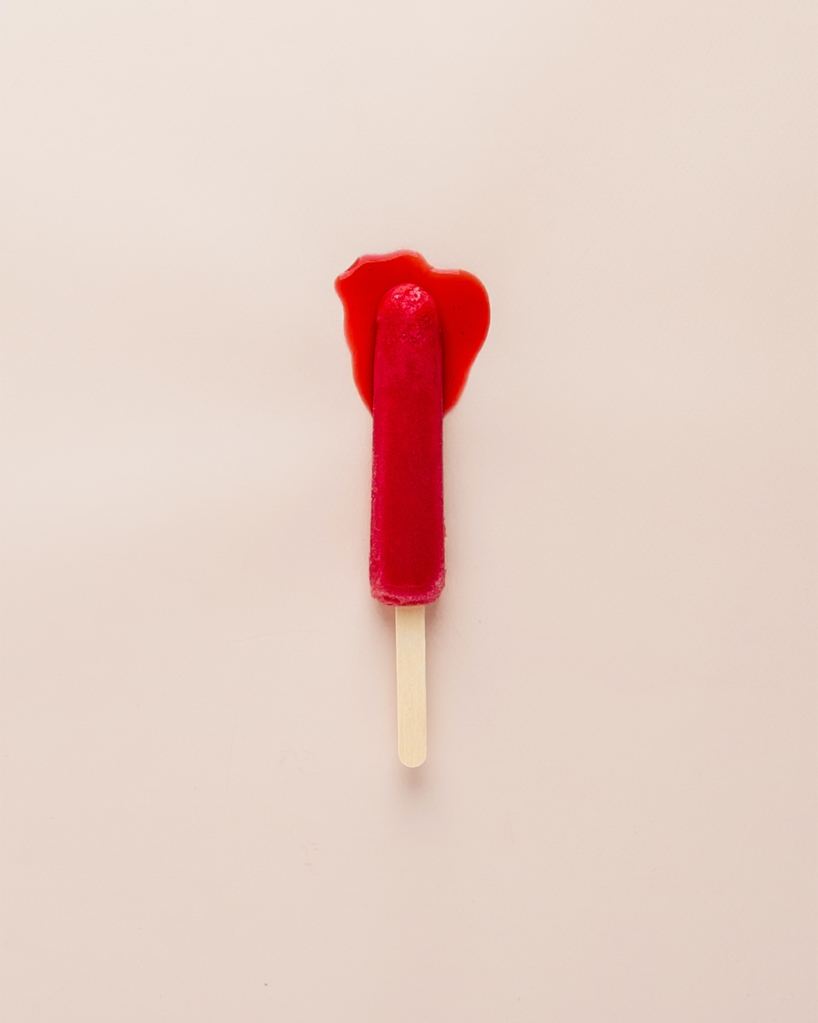 A red, half melted popsicle lying on the floor.
Pandora's Health Blog